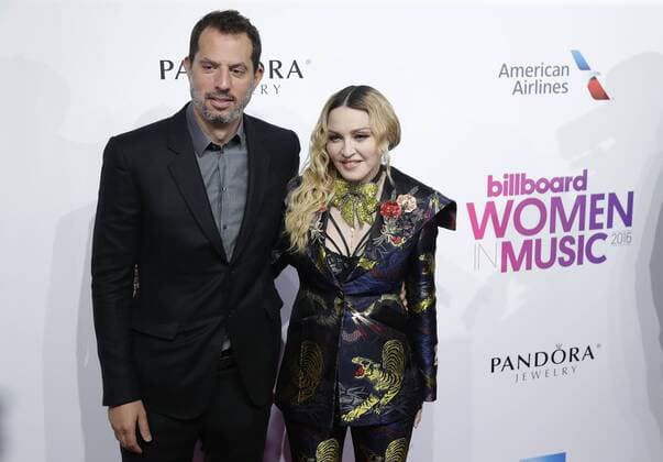 Madonna and Guy Oseary arrive on the red carpet at the Billboard Women in Music 2016 event on December 9, 2016 in New York City.  NYP20161209108 JOHNxANGELILLO
