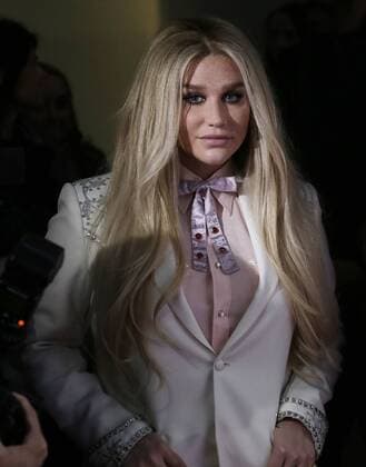 Kesha arrives on the red carpet at the Billboard Women in Music 2016 event on December 9, 2016 in New York City.  NYP20161209126 JOHNxANGELILLO