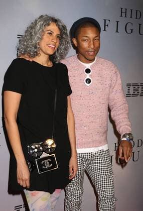 December 10, 2016 - New York, New York, U.S. - Singer PHARRELL WILLIAMS and MIMI VALDES attend the New York Special Screening of Hidden Figures held at the SVA Theatre. New York U.S. - ZUMAk03_ 20161210_zaf_k03_151