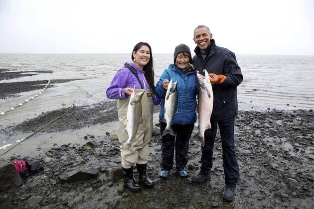 Sept. 2, 2015 - Dillingham, AK, US - U.S. President Barack Obama poses with freshly caught sockeye salmon during a visit with local fishermen and their families on Kanakanak Beach along Bristol Bay September 2, 2015 in Dillingham, Alaska. Barack Hussein Obama II (born August 4, 1961) is the 44th President of the United States. He is the first African American to be elected to office and the first president born outside the contiguous United States. Born in Honolulu, Hawaii, Obama is a graduate of Columbia University and Harvard Law School. He worked as a civil rights attorney and taught constitutional law at the University of Chicago Law School from 1992 to 2004. While serving three terms representing the 13th District in the Illinois Senate from 1997 to 2004, he ran unsuccessfully in the Democratic primary for the United States House of Representatives in 2000. Dillingham US - ZUMAz03_ 20150902_shh_z03_592