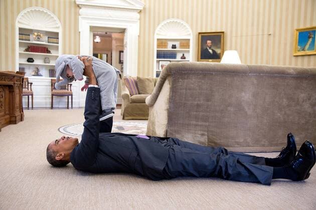 Oct. 30, 2015 - Washington, US - U.S President Barack Obama lifts Ella Rhodes, daughter of Deputy National Security Advisor Ben Rhodes, in her elephant costume during a Halloween in the Oval Office of the White House October 30, 2015 in Washington, DC. Barack Hussein Obama II (born August 4, 1961) is the 44th President of the United States. He is the first African American to be elected to office and the first president born outside the contiguous United States. Born in Honolulu, Hawaii, Obama is a graduate of Columbia University and Harvard Law School. He worked as a civil rights attorney and taught constitutional law at the University of Chicago Law School from 1992 to 2004. While serving three terms representing the 13th District in the Illinois Senate from 1997 to 2004, he ran unsuccessfully in the Democratic primary for the United States House of Representatives in 2000. Washington - ZUMAz03_ 20151030_shh_z03_689