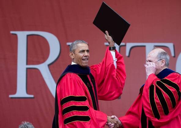 May 18, 2016 - New Brunswick, NJ, United States of America - U.S President Barack Obama holds up his diploma after receiving an honorary degree following his commencement address at Rutgers University May 15, 2016 in New Brunswick, New Jersey. Barack Hussein Obama II (born August 4, 1961) is the 44th President of the United States. He is the first African American to be elected to office and the first president born outside the contiguous United States. Born in Honolulu, Hawaii, Obama is a graduate of Columbia University and Harvard Law School. He worked as a civil rights attorney and taught constitutional law at the University of Chicago Law School from 1992 to 2004. While serving three terms representing the 13th District in the Illinois Senate from 1997 to 2004, he ran unsuccessfully in the Democratic primary for the United States House of Representatives in 2000. New Brunswick Unite - ZUMAz03_ 20160518_shs_z03_124