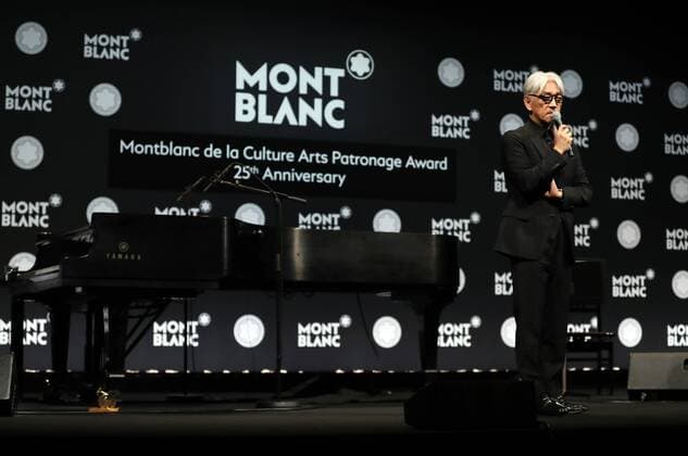 December 21, 2016, Tokyo, Japan - Japanese composer Ryuichi Sakamoto, a member of the Yellow Magic Orchestra (YMO) speaks after he received Montblanc de la Culture Arts Patronage Award in Tokyo on Wednesday, December 21, 2016. Sakamoto played his screen music Merry Christmas Mr. Lawrence with young musicians.  (lwxa006991)