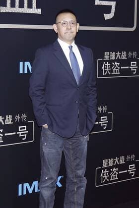 BEIJING, CHINA - DECEMBER 21: Actor Jiang Wen arrives at the red carpet of the premiere of film Rogue One: A Star Wars Story on December 21, 2016 in Beijing, China.  CFP497374453