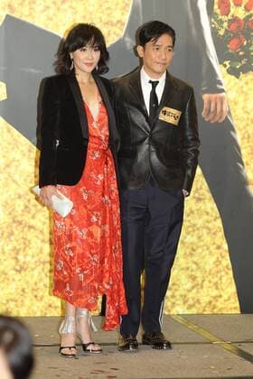 HONG KONG, CHINA - DECEMBER 22: Actor Tony Leung Chiu Wai and his wife actress Carina Lau attend the charity premiere of director Zhang Jiajia s film See You Tomorrow on December 22, 2016 in Hong Kong, China.  CFP497405331