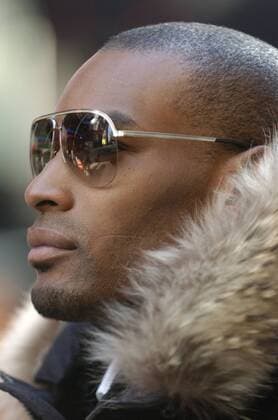 Jan 04, 2008 - Manhattan, NY, USA - Supermodel TYSON BECKFORD looks on as Bravo reveals the 14 men and women chosen for the new reality competition series Make Me A Supermodel in a photo shoot in Times Square. In the series, hosted by supermodels Tyson Beckford and Niki Taylor, the contestants will compete for the $100,000 prize and a modeling contract with New York Modeling Management. - ZUMAb09_ 20080104_bry_b09_029