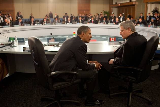 Jul. 21, 2010 - Toronto, ONTARIO - President Barack Obama talks with Canadian Prime Minister Stephen Harper at the opening Plenary Session of the G20 Summit in Toronto, Canada, Sunday, June 27, 2010. Barack Hussein Obama II (born August 4, 1961) is the 44th President of the United States. He is the first African American to be elected to office and the first president born outside the contiguous United States. Born in Honolulu, Hawaii, Obama is a graduate of Columbia University and Harvard Law School. He worked as a civil rights attorney and taught constitutional law at the University of Chicago Law School from 1992 to 2004. While serving three terms representing the 13th District in the Illinois Senate from 1997 to 2004, he ran unsuccessfully in the Democratic primary for the United States House of Representatives in 2000. Toronto - ZUMAz03_ 20100721_shh_z03_869