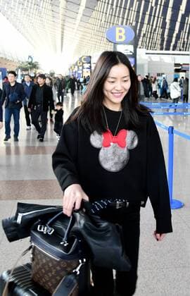 SHANGHAI, CHINA - DECEMBER 31: Fashion model Liu Wen seen at the airport on December 31, 2016 in Shanghai, China.  CFP497682820