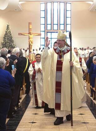 January 4, 2017 - St. Petersburg, Florida, U.S. - SCOTT KEELER Times. New Bishop of the Diocese of St. Petersburg Gregory L. Parkes, greets parishioners at the Cathedral of St. Jude the Apostle, St. Petersburg at the conclusion of his installment, Wednesday, 1 4 16. Parkes is the fifth Bishop of the Diocese. St. Petersburg U.S. - ZUMAs70_ 20170104_zan_s70_037