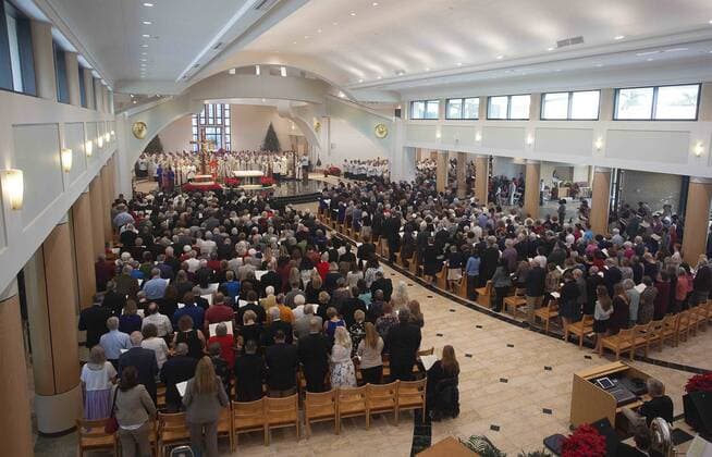 January 4, 2017 - St. Petersburg, Florida, U.S. - SCOTT KEELER Times. Parishioners fill the Cathedral of St. Jude the Apostle, St. Petersburg for the installation of new Bishop Gregory L. Parkes, 1 4 16 in St. Petersburg of the Diocese of St. Petersburg. St. Petersburg U.S. - ZUMAs70_ 20170104_zan_s70_042