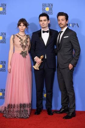 Jan 8, 2017 - Beverly Hills, California, U.S - After winning the category of BEST SCREENPLAY âMOTION PICTURE for La La Land, DAMIEN CHAZELLE poses backstage with presenters FELICITY JONES and DIEGO LUNA in the press room with the Golden Globe Award at the 74th Annual Golden Globe Awards at the Beverly Hilton in Beverly Hills, CA on Sunday, January 8, 2017. Beverly Hills U.S - ZUMAz03_ 20170108_sha_z03_471