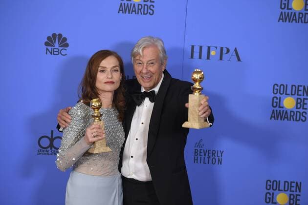 January 8, 2017 - Los Angeles, California, U.S. - ISABELLE HUPPERT and PAUL VERHOEVEN celebrate their win backstage for ELLE at the 74th Annual Golden Globe Awards, at The Beverly Hilton in Beverly Hills. Los Angeles U.S. - ZUMAz03_ 20170108_zbp_z03_431
