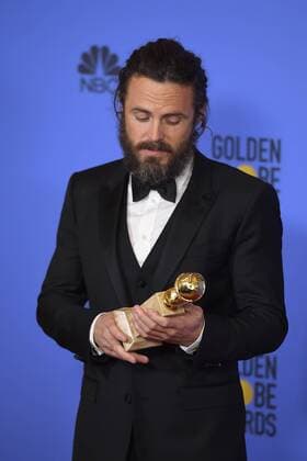 January 8, 2017 - Los Angeles, California, U.S. - CASEY AFFLECK celebrates his win at the 74th Annual Golden Globe Awards, at The Beverly Hilton in Beverly Hills. Los Angeles U.S. - ZUMAz03_ 20170108_zbp_z03_448