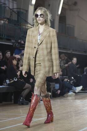 London: Vivienne Westwood Fashion Show Vivienne Westwood s runway at LFW Men s January 2017. A model walks the runway at the Vivienne Westwood show during London Fashion Week Men s collections at Seymour Leisure Centre. Dame Vivienne Isabel Westwood is a British fashion designer and businesswoman, largely responsible for bringing modern punk and new wave fashions into the mainstream. Westwood came to public notice when she made clothes for Malcolm McLaren s boutique in the King s Road, which became famous as SEX  AlbertoxPezzali
