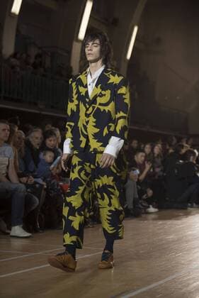 London: Vivienne Westwood Fashion Show Vivienne Westwood s runway at LFW Men s January 2017. A model walks the runway at the Vivienne Westwood show during London Fashion Week Men s collections at Seymour Leisure Centre. Dame Vivienne Isabel Westwood is a British fashion designer and businesswoman, largely responsible for bringing modern punk and new wave fashions into the mainstream. Westwood came to public notice when she made clothes for Malcolm McLaren s boutique in the King s Road, which became famous as SEX  AlbertoxPezzali