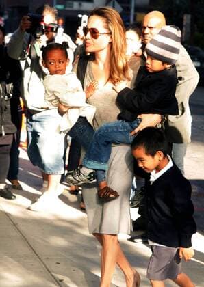 Sep 20, 2007 - New York, NY, USA - Actress ANGELINA JOLIE holds her children ZAHARA JOLIE-PITT and Pax Jolie-Pitt as she takes her son MADDOX JOLIE-PITT to school at the Lycee Francais de New York . - ZUMAk03_ 20070920_nan_k03_004