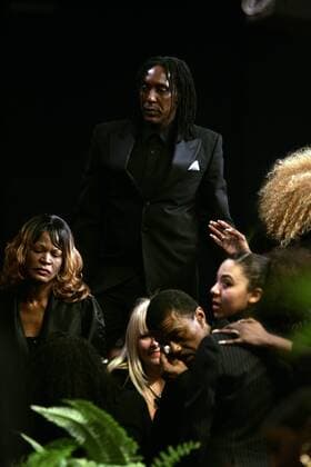 Dec 21, 2007 - Gardena, CA, USA - RONALD TURNER , the only son of Ike and Tina Turner, and IKE TURNER JR in the foreground grieve at the funeral for Ike Turner, who was considered one of the founding fathers of rock music, but his career was often overshadowed by run - ins with the law and a stormy marriage to Tina Turner. Turner died December 12 at his home in San Marcos. He was 76. Photo by Jonathan Alcorn ZUMA Press. - ZUMAa01_ 20071221_alc_a01_015