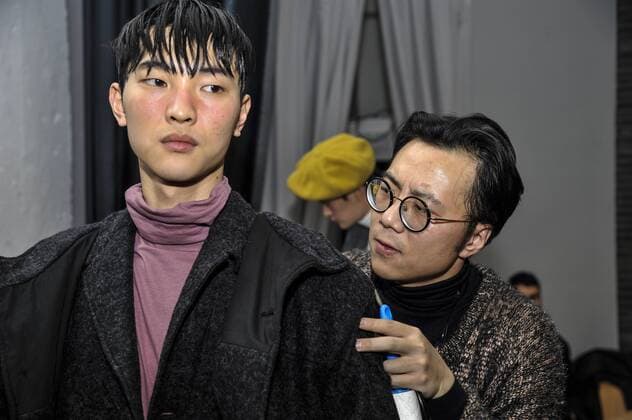 Italy: Miao Ran himself - Miaoran backstage at Milan Fashion week Models are seen on backstage of Miaoran show during Milan Men s Fashion Week Fall Winter.  GaetanoxPiazzolla