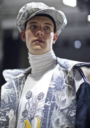 MILAN, Jan. 16, 2017 -- A model waits at backstage ahead of the Fall Winter 2017 18 menswear collection of MIAORAN by Chinese designer Miao Ran during Milan Fashion Week in Milan, Italy, on Jan. 16, 2017. )(gl) ITALY-MILAN-FASHION WEEK-MEN-CHINESE DESIGNER-MIAORAN JinxYu 