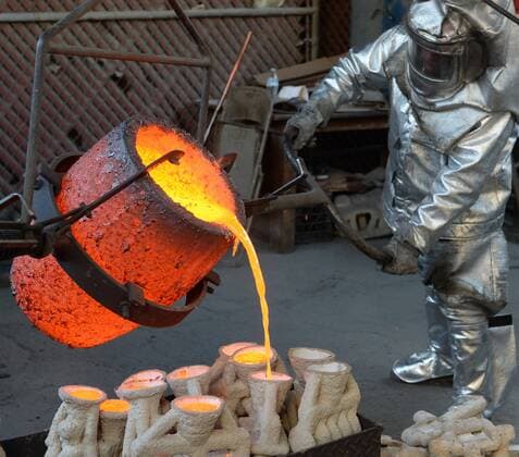 Workers in fire suits pour molten bronze metal into molds during the casting of the Screen Actors Guild Award statuettes at the American Fine Arts Foundry in Burbank, California on January 17, 2017. Winners are to be announced during a live simulcast on TNT and TBS in Los Angeles on January 29, 2017.  LAP2017011706 JIMxRUYMEN