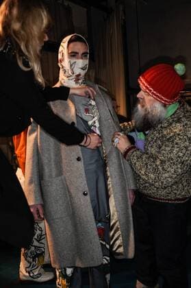 France:Beirendonck backstage at PFW Walter van Beirendonck dressing a model. backstage, Paris man s fashion week.  GaetanoxPiazzolla