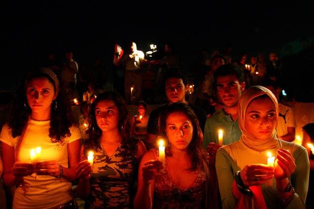 Jul 31, 2006; Beirut, LEBANON; Lebanese light candles during a sit-in at Martyrs square in central Beirut 30 July 2006. At least 51 people were killed, many of them children, when Israeli war planes blitzed the southern Lebanese village of Qana, the deadliest single strike since the Jewish state unleashed its war on Hezbollah 19 days ago Israel s military campaign began three weeks ago after Hezbollah militants captured two Israeli soldiers. Lebanon says more than 900 people have died since then, most of them civilians. Israel has lost 29 civilians and about 40 soldiers.  - ZUMA 017 20060731_rua_p53_164