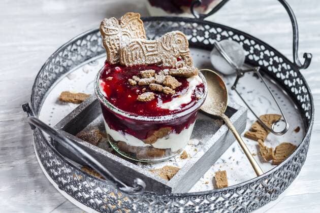 Glass of dessert of almond biscuits, Greek yoghurt and cranberry compote  SBDF03120