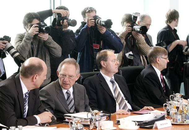 Mar 08, 2006 - Berlin, GERMANY - Beginning of the working session in the cabinet of Angela Merkel. PICTURED: Minister for Transport, Building and Urban Affairs WOLFGANG TIEFENSEE, Minister of the Interior WOLFGANG SCHAEUBLE, Minister of Finance PEER STEINBRUECK and Parliamentary State Secretary in the German Ministry of Economics and Technology PETER HINTZE. The Cabinet of Germany is the chief executive body of the Federal Republic of Germany. It consists of the Chancellor and the cabinet ministers - ZUMAkg1_ 20060308_olc_k98_836 Copyright: xK98x