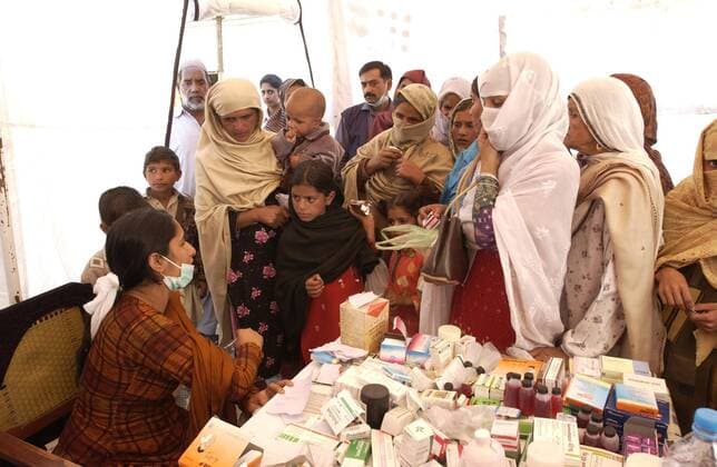 Oct 22, 2005; Garhi Habibullah, Kashmir, PAKISTAN; UNFPA, the United Nations Population Fund, had made it possible to get maternity facilities up and running in a short time with the use of their Mobile Units. They also provide other services for Women and Children, such as handing out vitamins and amino acids. This is critical as the whole hospital was destroyed in the Pakistani earthquake devastated the region on Oct. 8, 2005. In this Mobile Unit, 120 patients are seen per day. Mandatory - ZUMAz03_ 20051022_mkh_z03_594 Copyright: xEvanxSchneider UNxPhotox