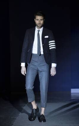USA: The Blue Jacket Fashion Show Alessandro Mele in Thom Browne dress walks runway for the blue jacket fashon show in support for prostate cancer awarness during New York Fashion week at Pier 59  LevxRadin