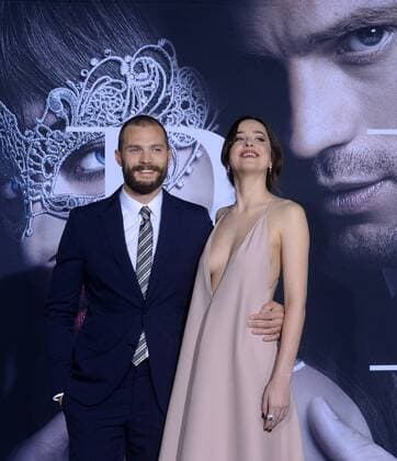Cast members Jamie Dornan and Dakota Johnson attend the Fifty Shades Darker premiere at the Ace Hotel Theatre in Los Angeles on February 2, 2017. Storyline: While Christian wrestles with his inner demons, Anastasia must confront the anger and envy of the women who came before her.  LAP2017020212 JIMxRUYMEN
