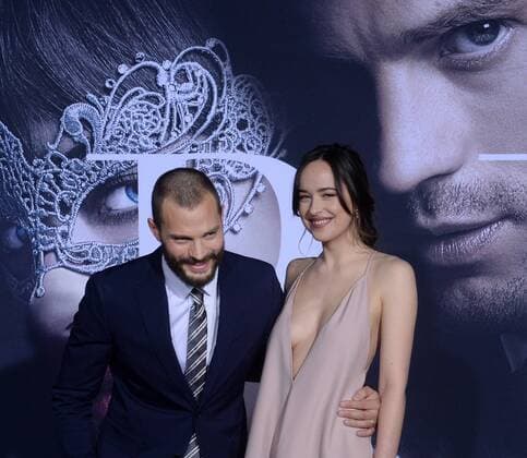 Cast members Jamie Dornan and Dakota Johnson attend the Fifty Shades Darker premiere at the Ace Hotel Theatre in Los Angeles on February 2, 2017. Storyline: While Christian wrestles with his inner demons, Anastasia must confront the anger and envy of the women who came before her.  LAP2017020213 JIMxRUYMEN
