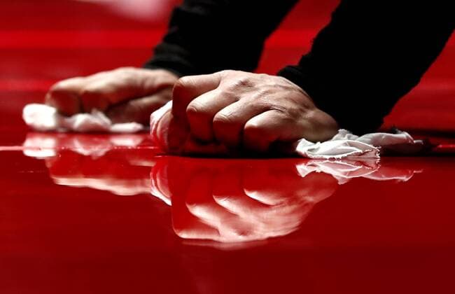 Workers prepare the runway before The American Heart Association s Go Red For Women Red Dress Collection 2017 fashion show presented by Macy s on February 9, 2017 in New York City.  NYP20170209163 JOHNxANGELILLO