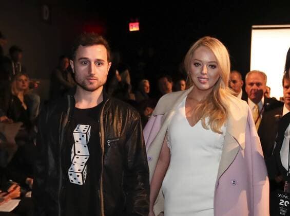 (170211) -- NEW YORK, Feb. 11, 2017 -- Tiffany Trump (R) and her boyfriend Ross Mechanic walk to their seats before the fashion show of Chinese designer Wang Tao during the New York Fashion Week in New York, the United States, on Feb. 11, 2017. At the invitation of the designer Wang Tao, Tiffany Trump, daughter of U.S. President Donald Trump, watched the Taoray Wang show as a guest on Saturday. ) U.S.-NEW YORK-FASHION WEEK-TIFFANY TRUMP WangxYing 