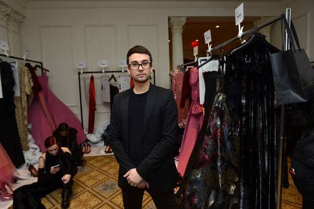Christian Siriano poses backstage just before his fashion show at New York Fashion Week: The Plaza Hotel on February 11, 2017 in New York City.  NYP20170211862 ANDREAxHANKS