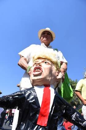 February 12, 2017 - Mexico City, Mexico - A demonstrator is seen with a Donald Trump pinata take part at protests against US president Donald Trump because The lifting of the wall at the border to avoid cross-border migration at Reforma Avenue on February 12, 2017 in Mexico City, Mexico Mexico City Mexico  - ZUMAn230 20170212_zaa_n230_486 Copyright: xCarlosxTischlerx