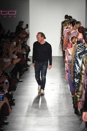 Designer Custo Barcelona greets the audience after his fashion show at New York Fashion Week: Milk Studios at Pier 59 on February 12, 2017 in New York City.  NYP20170212926 ANDREAxHANKS