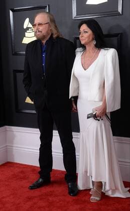 Singer Barry Gibb and Linda Gray arrive for the 59th annual Grammy Awards held at Staples Center in Los Angeles on February 12, 2017.  LAP20170212283 JIMxRUYMEN