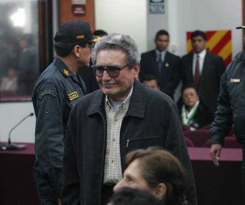 November 5, 2004 - Callao, LIMA, Peru - CALLAO, 5 DE NOVIEMBRE DEL 2004.INICIO DEL JUICIO QUE SE LE SIGUE A LA CUPULA TERRORISTA DE SENDERO LUMINOSO EN LA BASE NAVAL DEL CALLAO. EN LA AUDIENCIA SON PROCESADOS EL LIDER SENDERISTA ABIMAEL GUZMAN (EN IMAGEN), ELENA IPARRAGUIRRE Y .OS CUATRO CABECILLAS DE SENDERO. .  - ZUMAp94_ 20041105_zaf_p94_015 Copyright: xElxComerciox