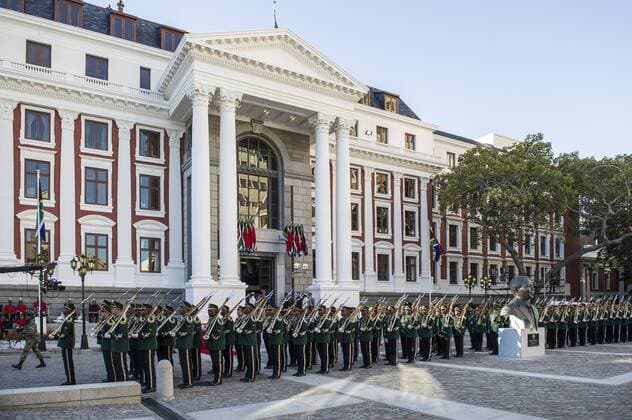 Clashes outside Parliament during SONA CAPE TOWN, SOUTH AFRICA ? FEBRUARY 09: President Jacob Zuma, his deputy Cyril Ramaphosa stand outside Parliament as the South African Defence Force (SANDF) members parade before the State of the Nation Address (SONA) on February 09, 2017 in Cape Town, South Africa. There was chaos, violence and insults as EFF members fought back as they were forcefully ejected from the chamber after holding up proceedings for nearly an hour, accusing Zuma of being a constitutional delinquent . ( Gallo0000247879