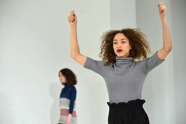 A model walks on the runway as a dancer performs at the Mara Hoffman fashion show at New York Fashion Week: The Shows at Shop Studios on February 13, 2017 in New York City.  NYP201702131036 ANDREAxHANKS