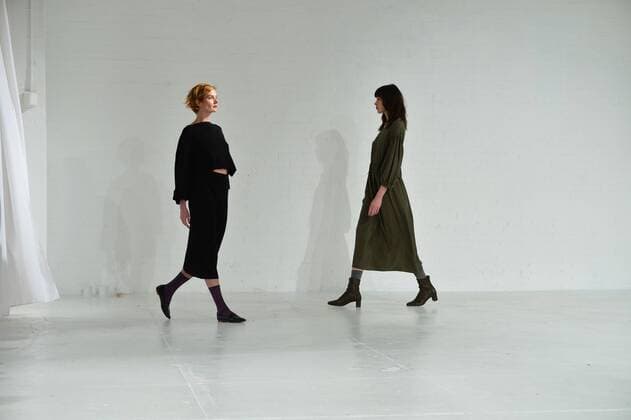 A model walks on the runway as a dancer performs at the Mara Hoffman fashion show at New York Fashion Week: The Shows at Shop Studios on February 13, 2017 in New York City.  NYP201702131039 ANDREAxHANKS