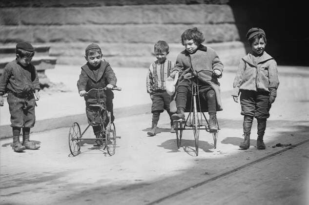 December 13, 2016 - Group of Children Playing in Street, Two with Tricycles, New York City, New York, USA, Bain News Service, April 1909 - ZUMAg145 20161213_zza_g145_016 Copyright: xJTxVintagex