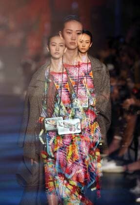The multiple exposure photo shows a model presenting a creation of Vivienne Tam during the 2017 New York Fashion Week in New York, the United States, on Feb. 15, 2017. ) (zy) U.S.-NEW YORK-FASHION WEEK-VIVIENNE TAM QinxLang 