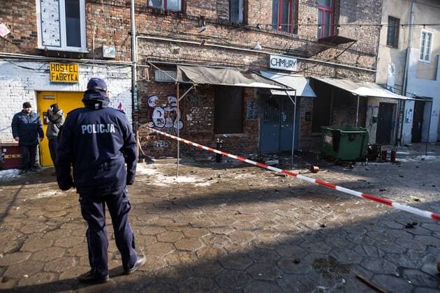 Attack on AFC Ajax fans in Warsaw An exterior view of the Chmury (Clouds) club in Warsaw s northern Praga district where AFC Ajax fans were attacked overnight on February 16, 2016 in Warsaw, Poland. It was stated, that a group of about a 50 black-clothed emblemless attackers threw bottles and stones at the club where the Dutch fans, who are in Warsaw for UEFA Europa League Legia vs. AFC Ajax match, were gathering at night. The group of aggressors fled the site just before the arrival of police while Ajax fans barricaded themselves inside the hostel where they are staying. No causalities were reported. EN_01245927_0015 