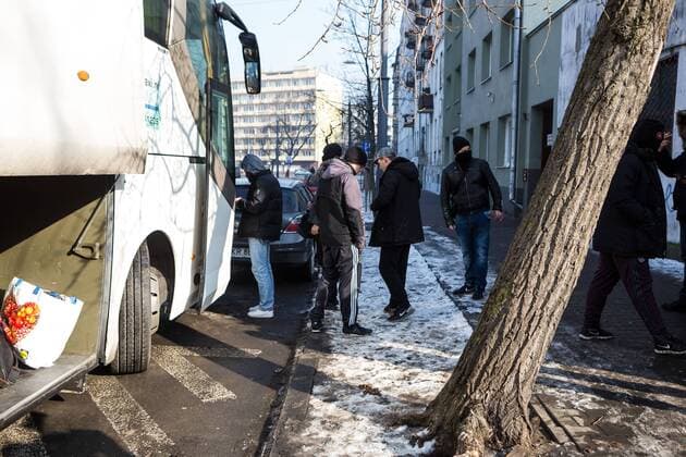 Attack on AFC Ajax fans in Warsaw An exterior view of the Chmury (Clouds) club in Warsaw s northern Praga district where AFC Ajax fans were attacked overnight on February 16, 2016 in Warsaw, Poland. It was stated, that a group of about a 50 black-clothed emblemless attackers threw bottles and stones at the club where the Dutch fans, who are in Warsaw for UEFA Europa League Legia vs. AFC Ajax match, were gathering at night. The group of aggressors fled the site just before the arrival of police while Ajax fans barricaded themselves inside the hostel where they are staying. No causalities were reported. Ajax fans are transported to the match. EN_01245927_0022 