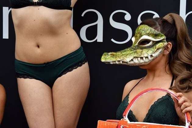 . 17 02 2017. London, United Kingdom. PETA models crash London Fashion Week. A trio of nearly naked models dressed in little more than lingerie and crocodile masks crash the first day of London Fashion Week, brandishing signs proclaiming, Cruelty to Crocodiles Unmasked and Animals Die for Exotic Skins. The action follows a recent PETA expose of crocodile farms in Vietnam including two that have supplied skins to a tannery owned by Louis Vuitton s parent company, LVMH which revealed that the animals are confined to tiny pits and sometimes hacked apart while they re still alive and thrashing, at 180 The Strand, London  xNilsxJorgensenx xi-Imagesx IIM-14415-0014