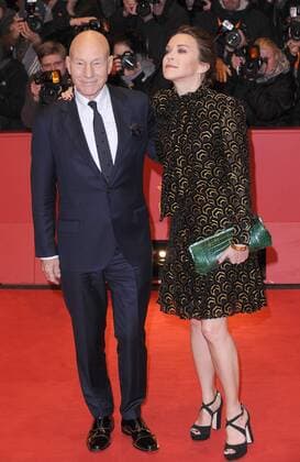 British actor Patrick Stewart and his wife American singer Sunny Ozell attend the premiere for Logan at the Grand Hyatt Hotel in Berlin on February 17, 2017.  LON20170217443 PAULxTREADWAY