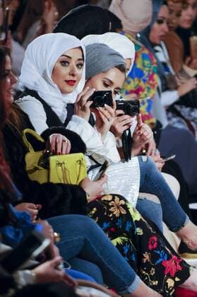 February 18, 2017 - London, UK - London, UK. Audience members watch the catwalk at the UK s first London Modest Fashion Week taking place this weekend at the Saatchi Gallery. The two day event sees 40 brands from across the world come together to showcase their collections for Muslim and other religious women. London UK  - ZUMAl94_ 20170218_zaf_l94_032 Copyright: xStephenxChungx