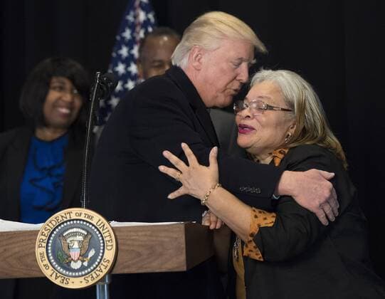 February 21, 2017 - Washington, District of Columbia, United States of America - United States President Donald Trump hugs Alveda King, niece of Martin Luther King Jr., as he delivers remarks after touring the Smithsonian National Museum of African American History & Culture in Washington, D.C. on February 21, 2017. Photo Credit: CNP AdMedia Washington United States of America - ZUMAa123 20170221_zaa_a123_009 Copyright: xKevinxDietschx